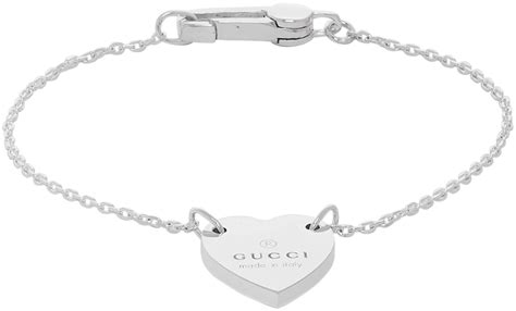 gucci bracelet with gucci trademark heart|Gucci trademark heart silver bracelet.